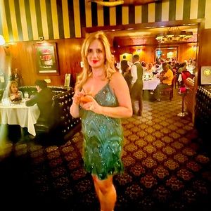 Plunging green sequin dress.